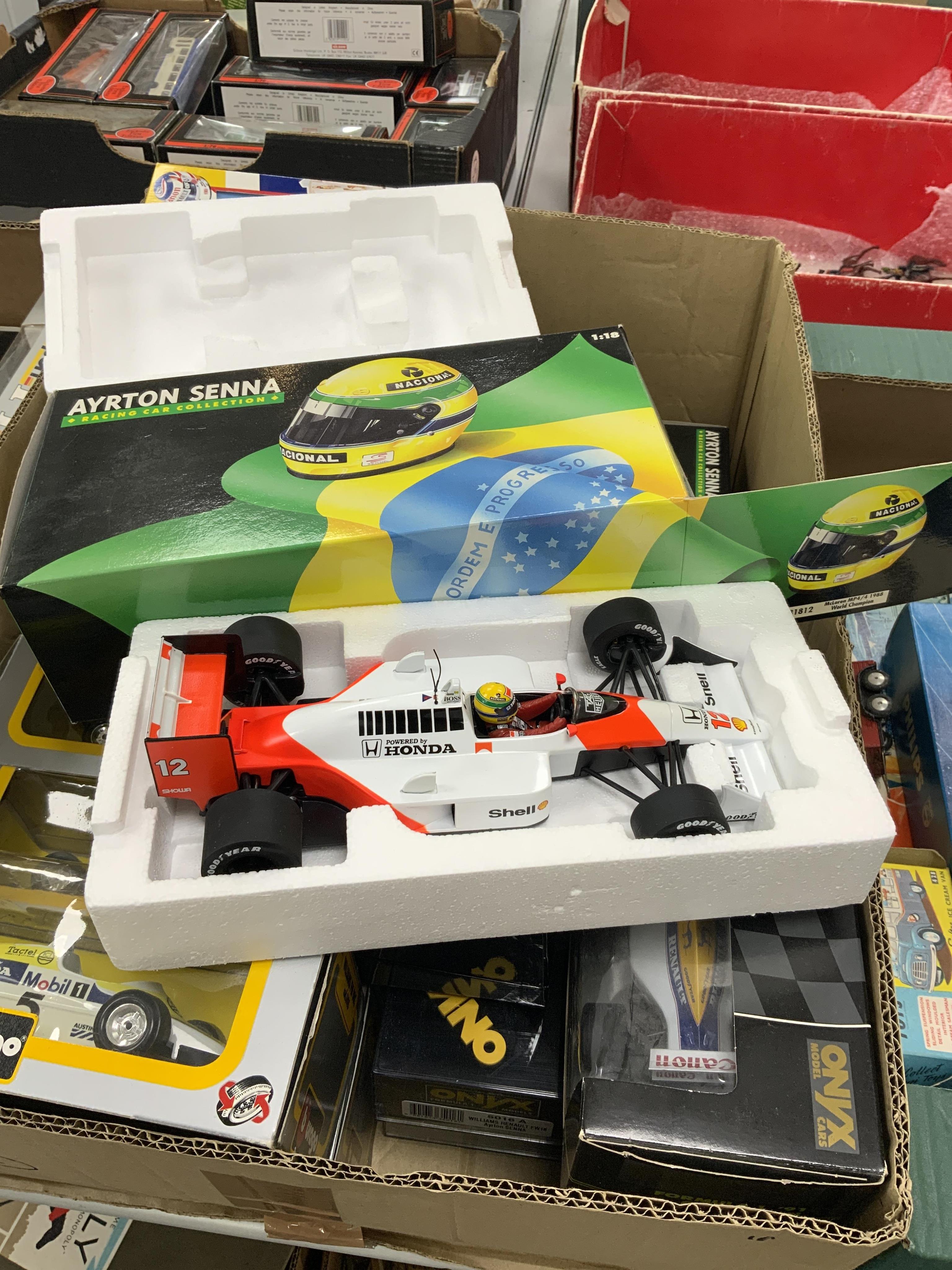 Twenty-one diecast motor racing related models by Onyx, Minichamps, Bburago, etc. including; three Onyx 1:24 scale formula One racing cars, eight Bburago 1:24 scale Formula One cars